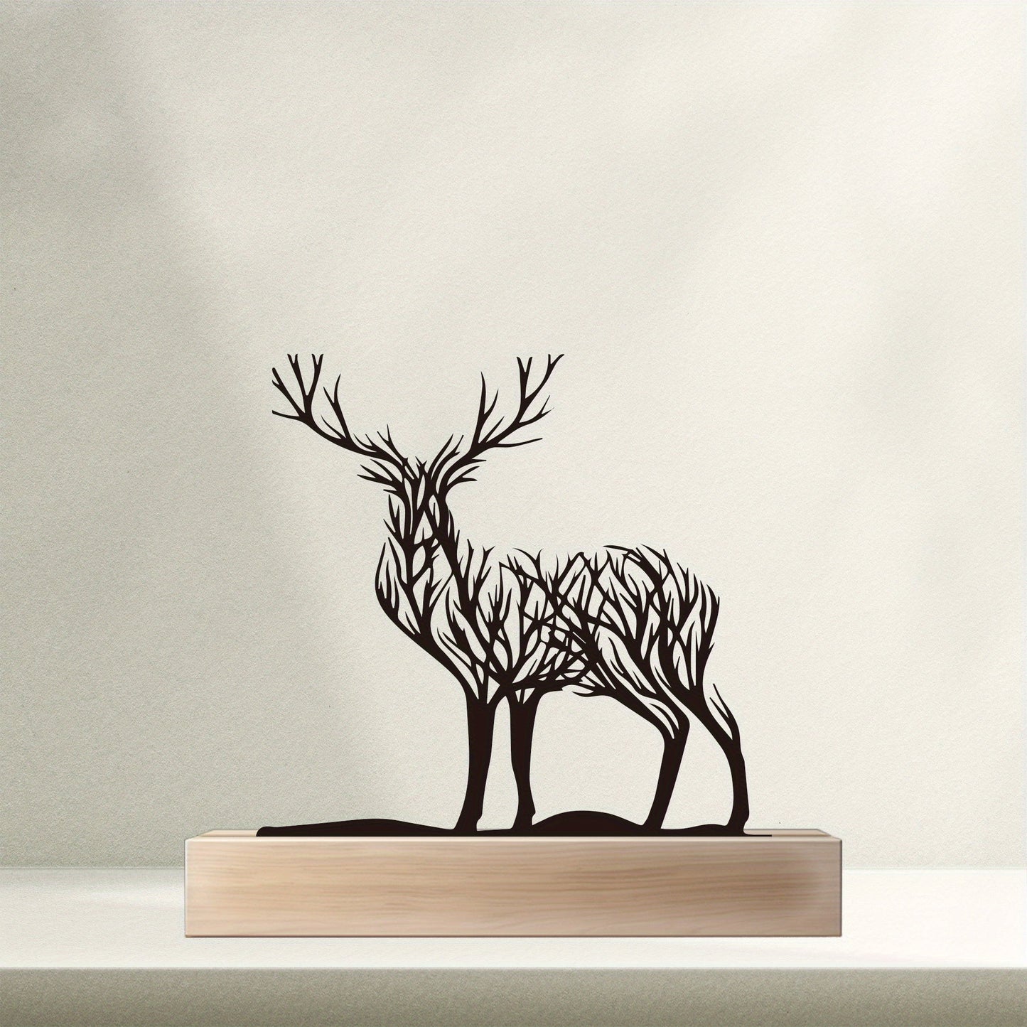 פסלון אייל מברזל על בסיס עץ — נקודת יופי שמחממת כל חלל