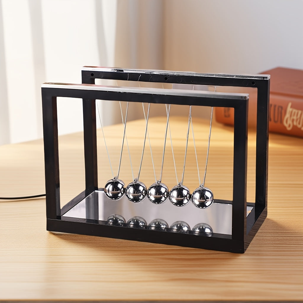 נדנדת ניוטון בעיצוב מודרני – נגיעה של סדר ושקט לכל חלל