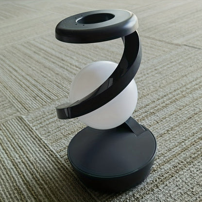 מנורת ספירלה “מרחפת” — כדור אור מסתובב שממלא את החדר בקסם