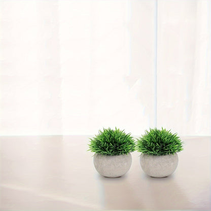 זוג עציצי ירוק מלאכותי בעציצי “בטון” אפור – קטנים, רעננים ותמיד נראים מושלם