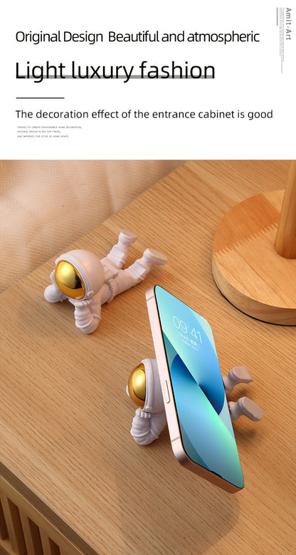 מחזיק טלפון אסטרונאוט — פריט דקורטיבי שעושה חיוך